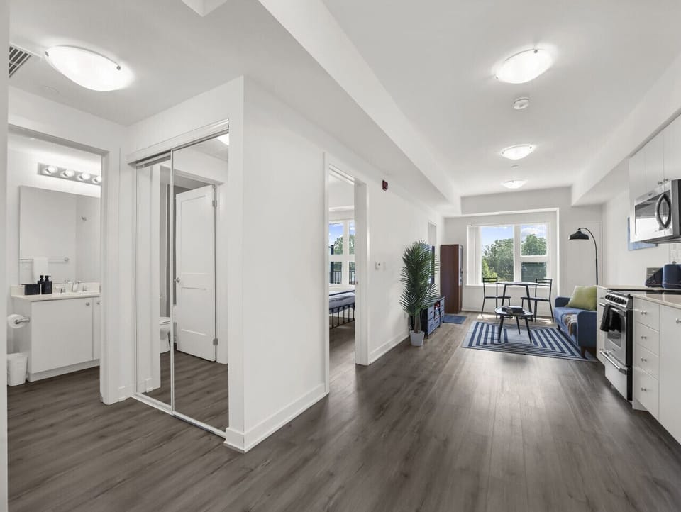 Experience modern, open-concept living. Navigate seamlessly between the stylish kitchen, cozy living room, and private spaces. Comfort and convenience flow through every area of your stay.
