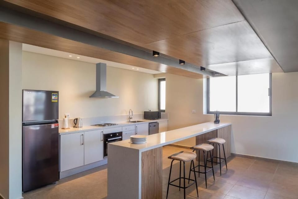 Apartment, Balcony, Garden View | Private kitchen | Electric kettle