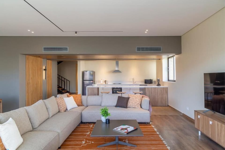 Apartment, Balcony, Garden View | Living area | Flat-screen TV