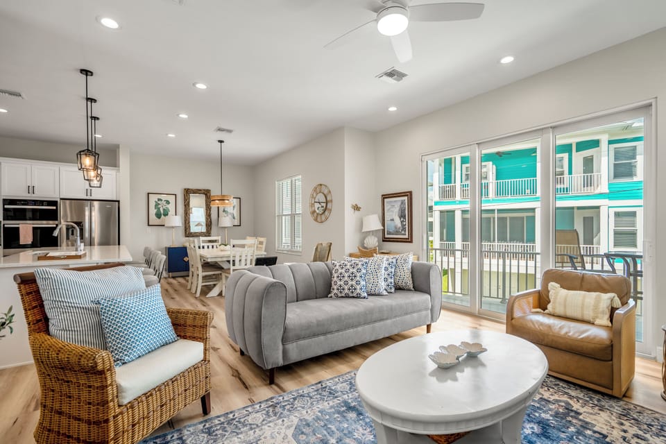 Comfortable living room area with a cozy couch and chairs—perfect for relaxing.
