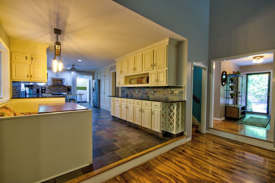 Open floor plan - foyer, living room, dining room, kitchen banquet, kitchen