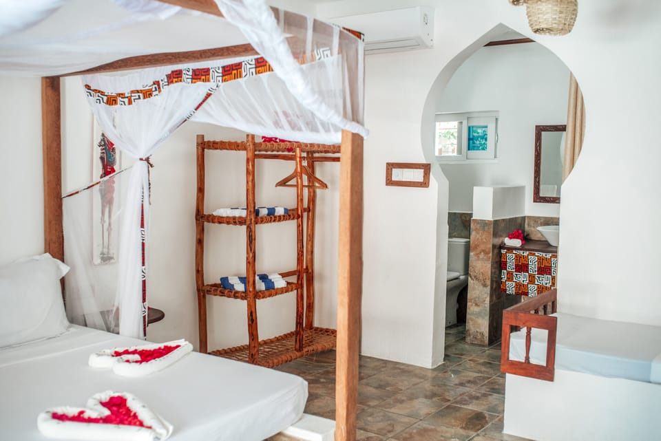 Family Room, Partial Ocean View | In-room safe, desk, free WiFi