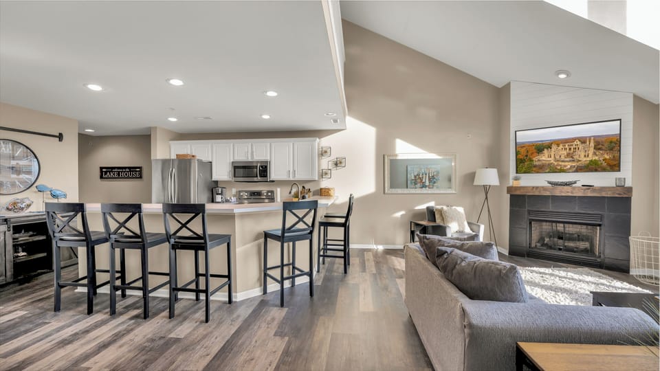 Open area kitchen bar and living area
