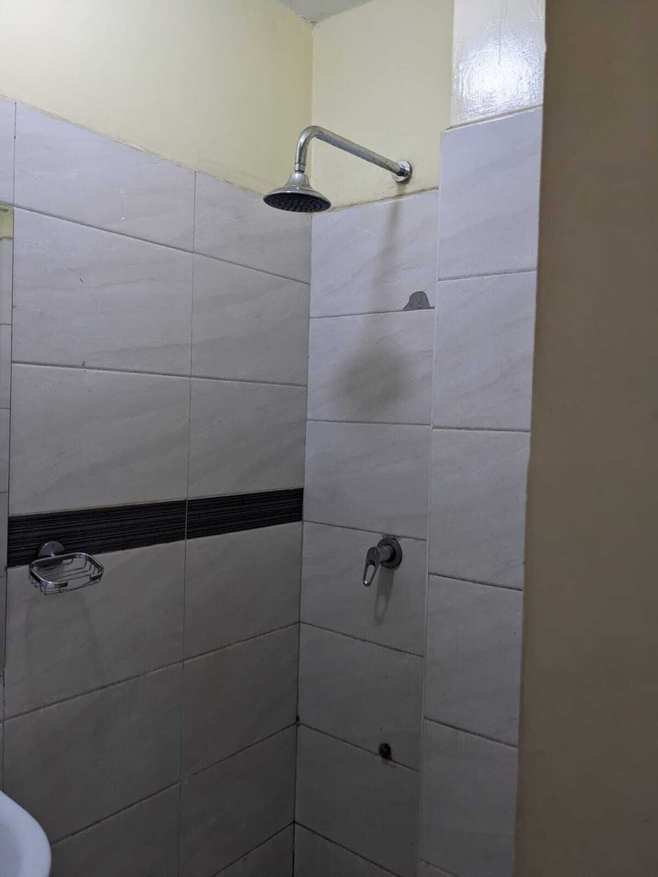 Shower, slippers, towels, soap