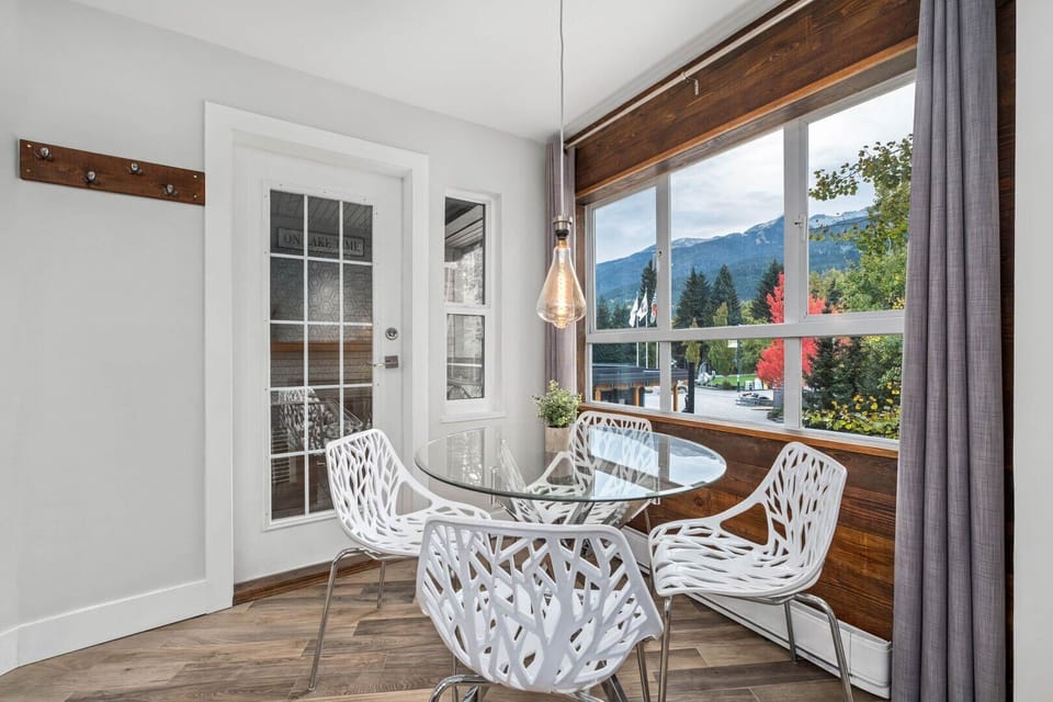 Share meals and make memories in the comfortable dining space with warm mountain views.