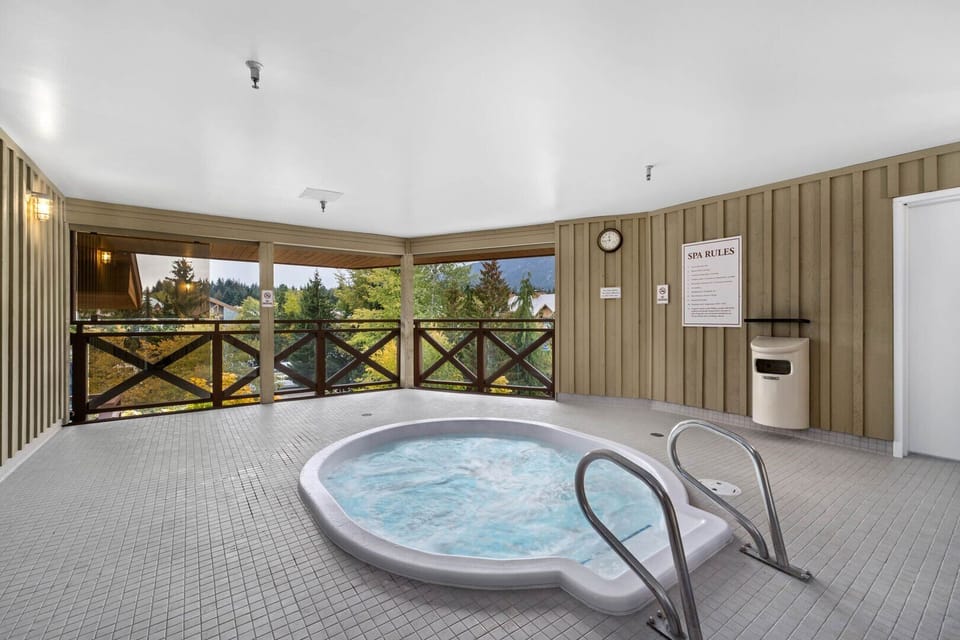 Unwind in the shared hot tub after a big mountain day.