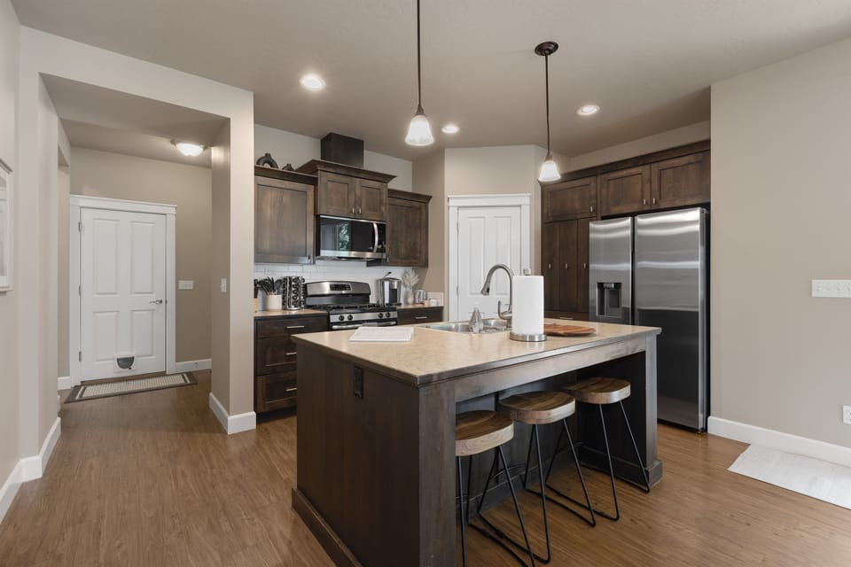 Spacious kitchen island perfect for cooking or casual dining.