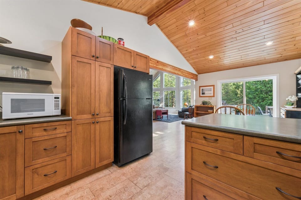 Thoughtfully designed kitchen with generous cabinetry and modern appliances, keeping everything you need close at hand.
