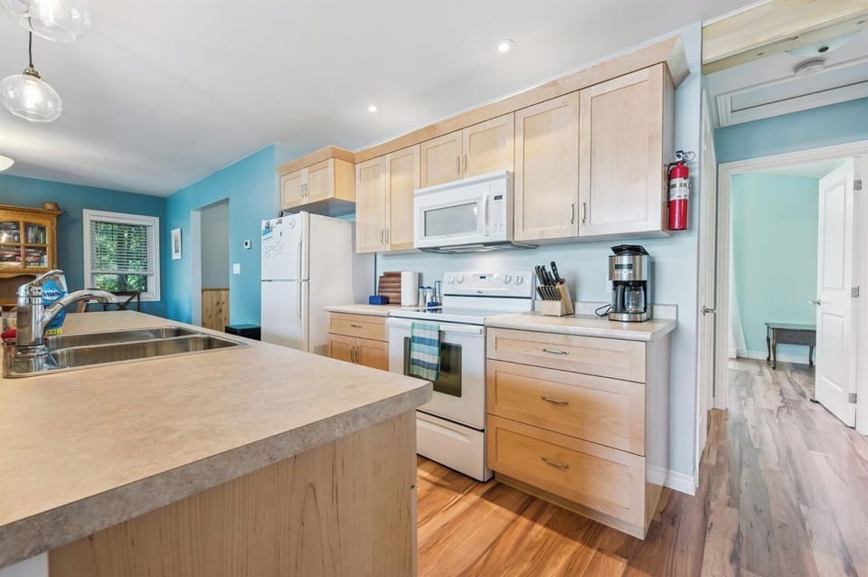 Bright, functional kitchen with everything you need to cook and gather with family or friends.