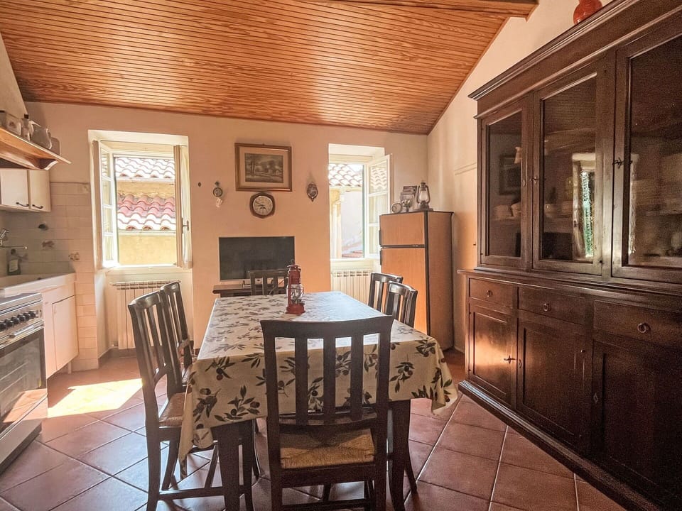 Furniture, Interior Design, Flooring, Wood, Ceiling, Floor, Kitchen & Dining Room Table, Room, Chair, Lighting