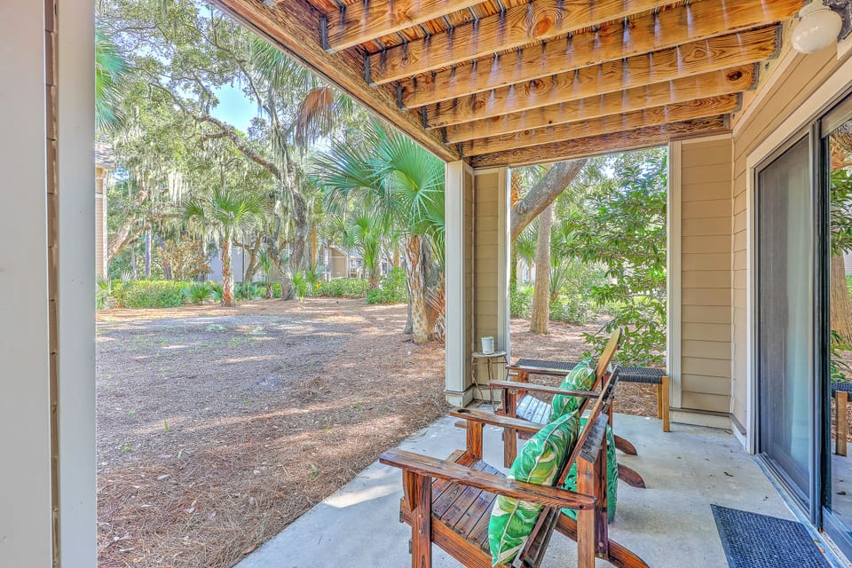 Step outside and relax on the patio surrounded by nature.