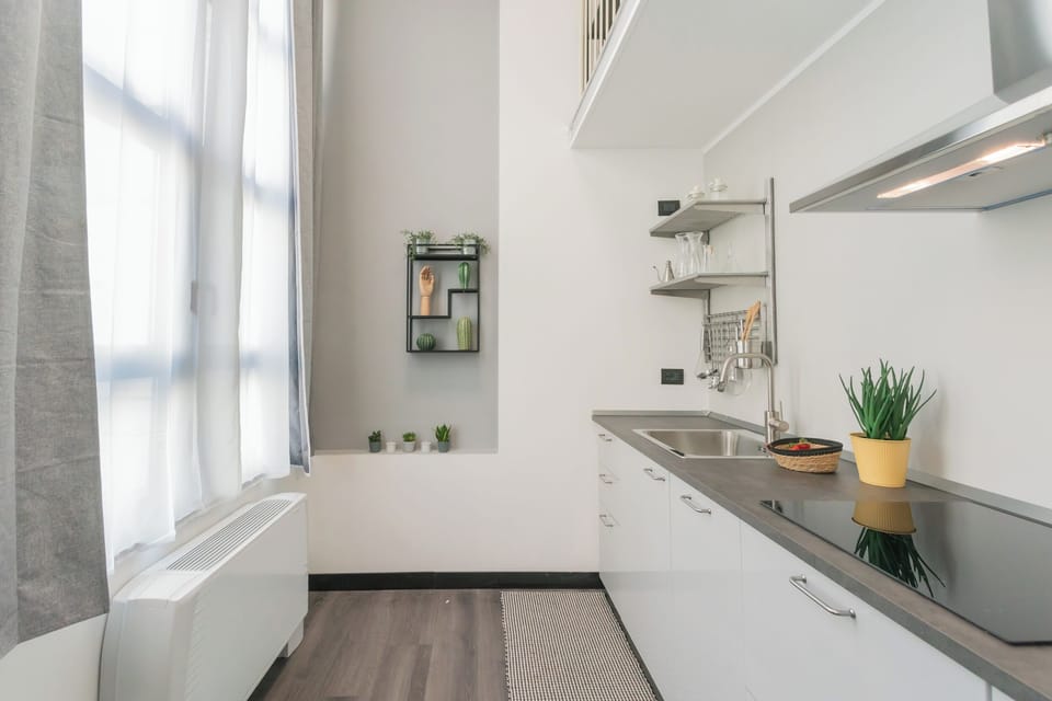 Apartment (1 Bedroom) | Private kitchenette | Microwave, stovetop, electric kettle, toaster
