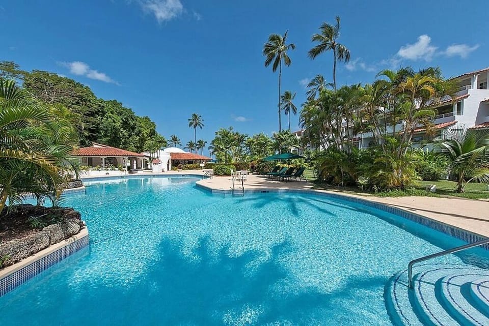 The pool with beach and sea beyond