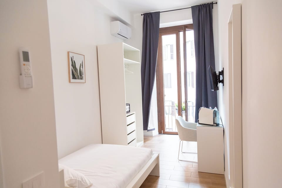 Classic Single Room, Balcony, Courtyard View | In-room safe, blackout drapes, iron/ironing board, free WiFi