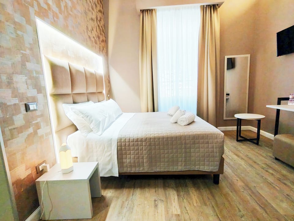 Deluxe Double or Twin Room, City View | Hypo-allergenic bedding, down comforters, in-room safe, desk