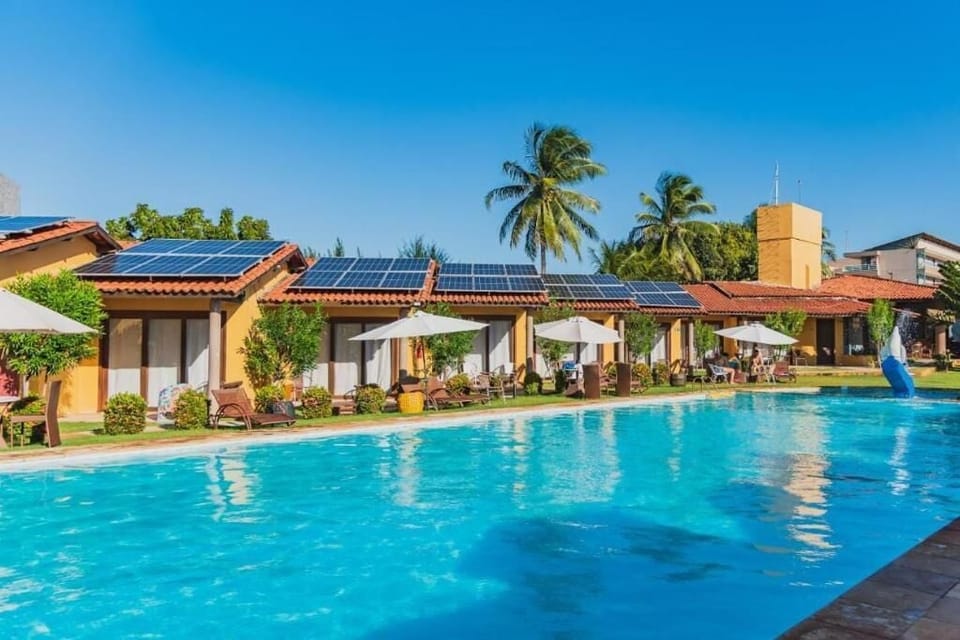Outdoor pool, open 8:00 AM to 8:00 PM, pool umbrellas, sun loungers