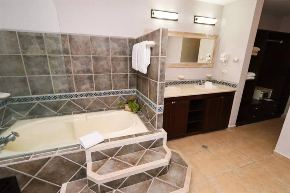 Hair dryer, towels, soap, shampoo