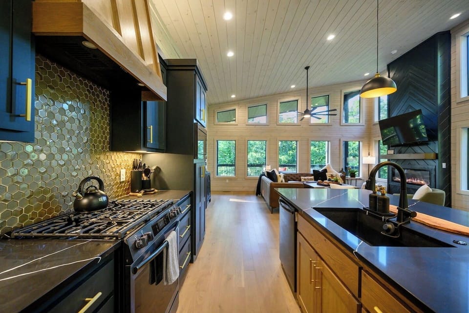 Check out the glass honeycomb backsplash!!!  Our chefs kitchen is fully loaded and a wonderful place to prepare meals!