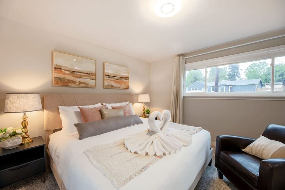 Experience a stay filled with personalized touches in our thoughtfully designed bedroom. Every detail, from the artwork to the decor, contributes to a uniquely welcoming atmosphere