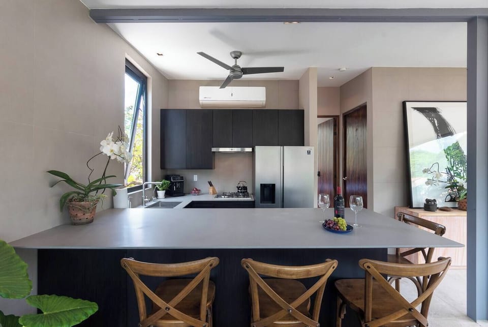 Luxury Penthouse, Balcony, Mountain View | Private kitchen | Coffee/tea maker, dining tables