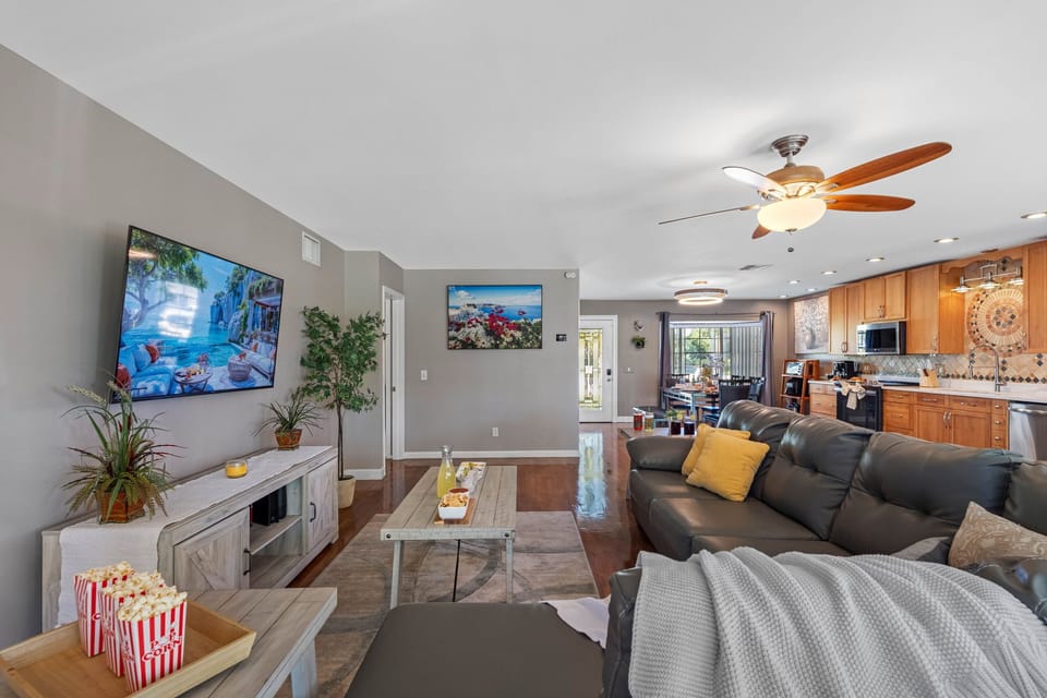 Designed with comfort in mind, the roomy sectional and multiple tables make this the ultimate hub for family activities.