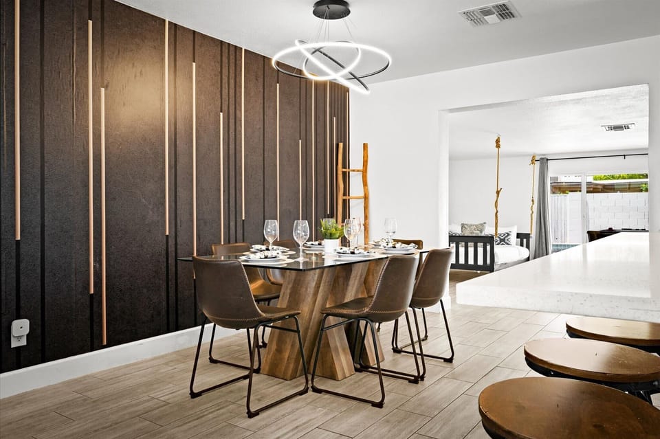 Our cozy dining area seats 6 comfortably — perfect for shared breakfasts, home-cooked dinners, or evening takeout after a day exploring Scottsdale.