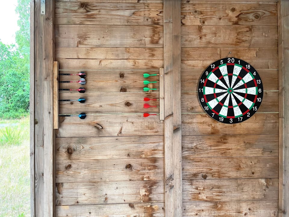 Fun for all ages – basketball, darts & cornhole.