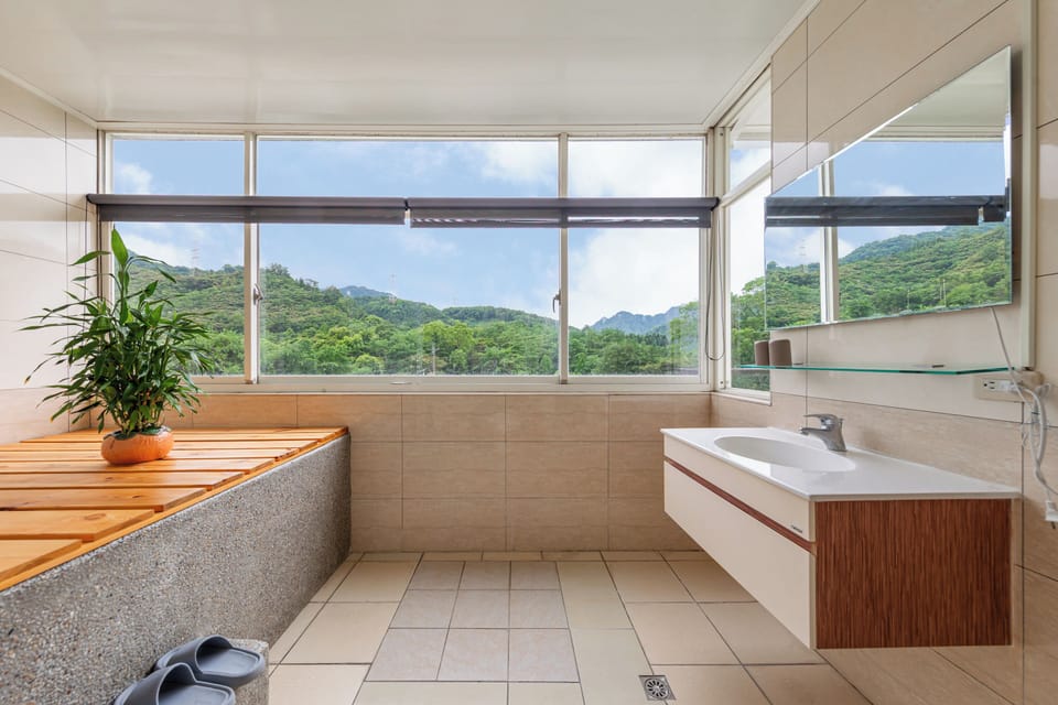 Mountain View Twin Room | Bathroom | Shower, hair dryer, slippers, towels