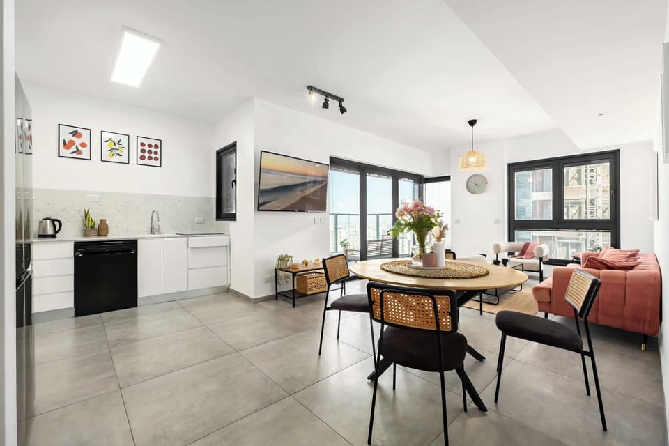 Airy open-plan layout connecting kitchen, dining, and lounge spaces for easy gatherings and comfortable everyday living.