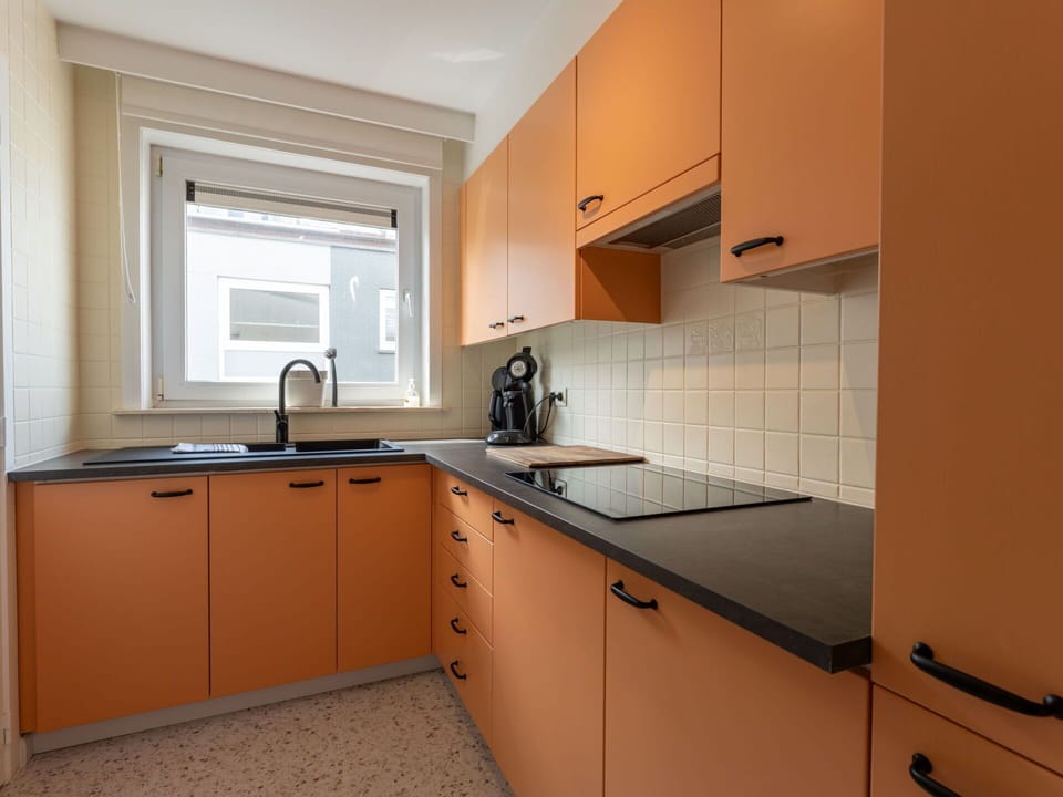 Kitchen, Countertop, Kitchen Sink, Cabinetry, Kitchen Appliance, Major Appliance, Wood, Sink, Interior Design, Plumbing Fixture