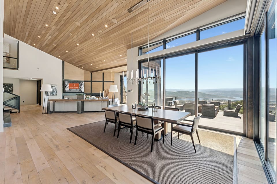 indoor/outdoor dining area with large window walls