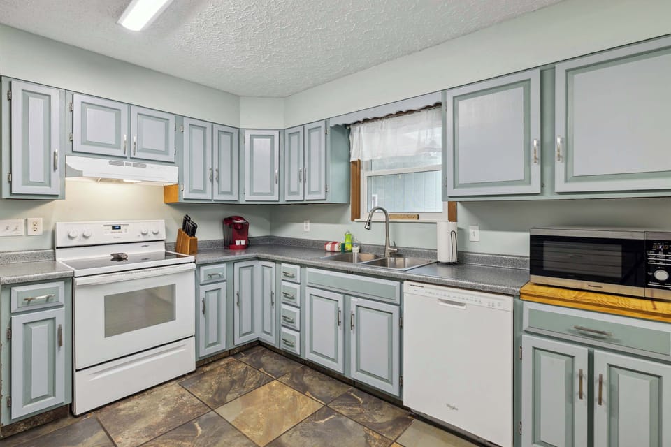 Unit A's fully equipped kitchen