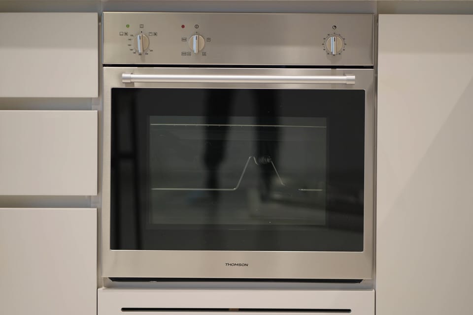 Deluxe Apartment, Balcony, Sea View | Private kitchen | Full-size fridge, microwave, oven, stovetop