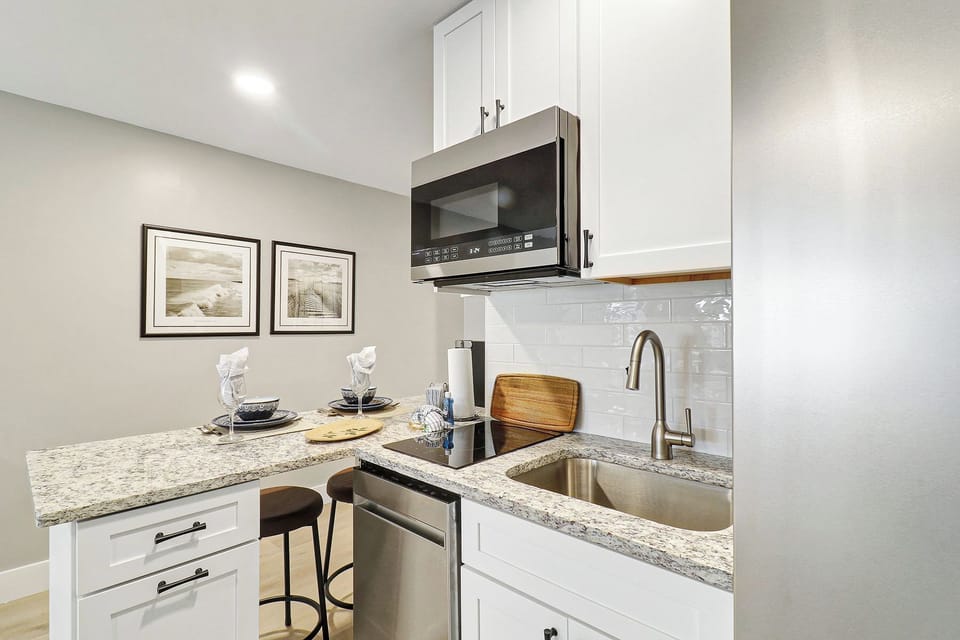 Two Burner cooktop, Fridge, Kuerig, microwave, dishwasher