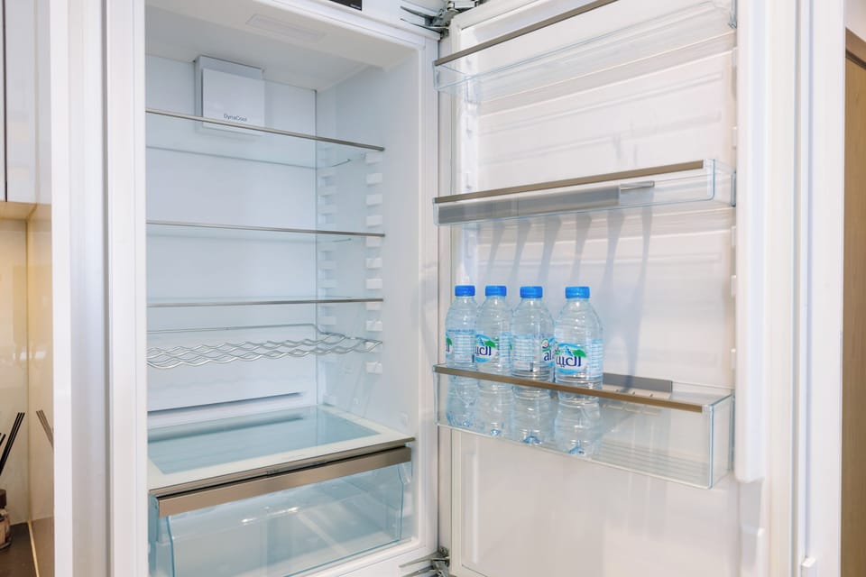 Deluxe Apartment, 1 King Bed, Balcony | Private kitchen | Highchair