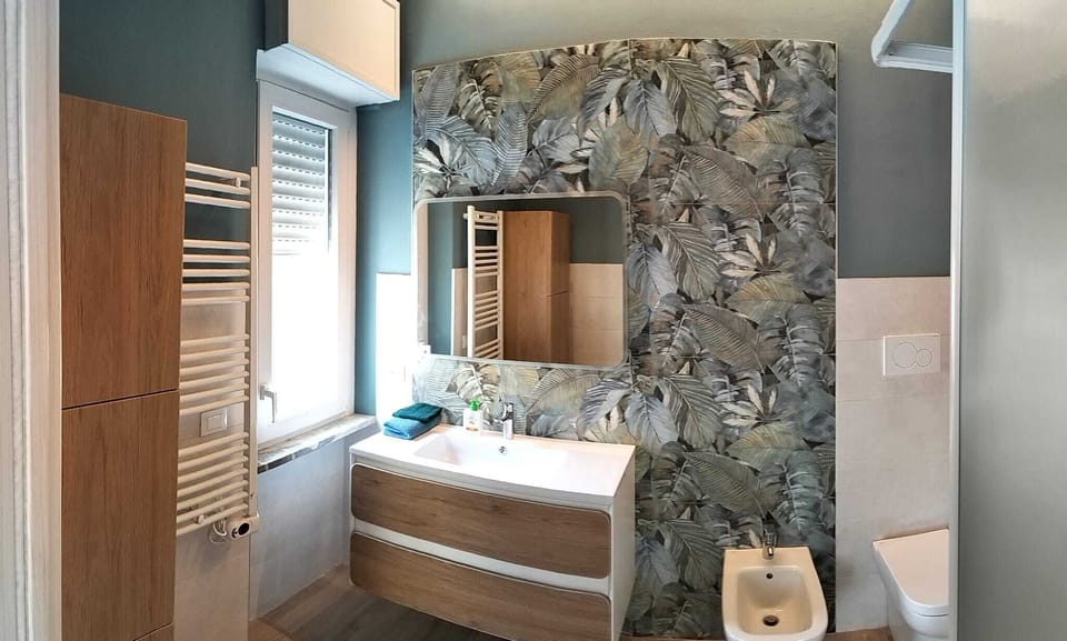 Triple Room | Bathroom | Shower, hair dryer, towels, soap