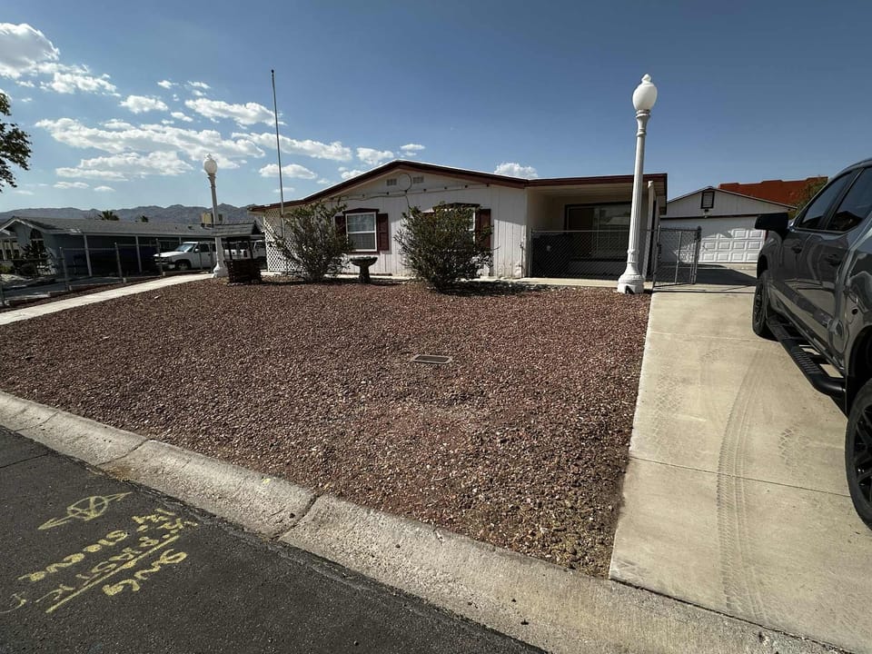 Two large driveways for ample parking bring your SXS or average sized boat.
