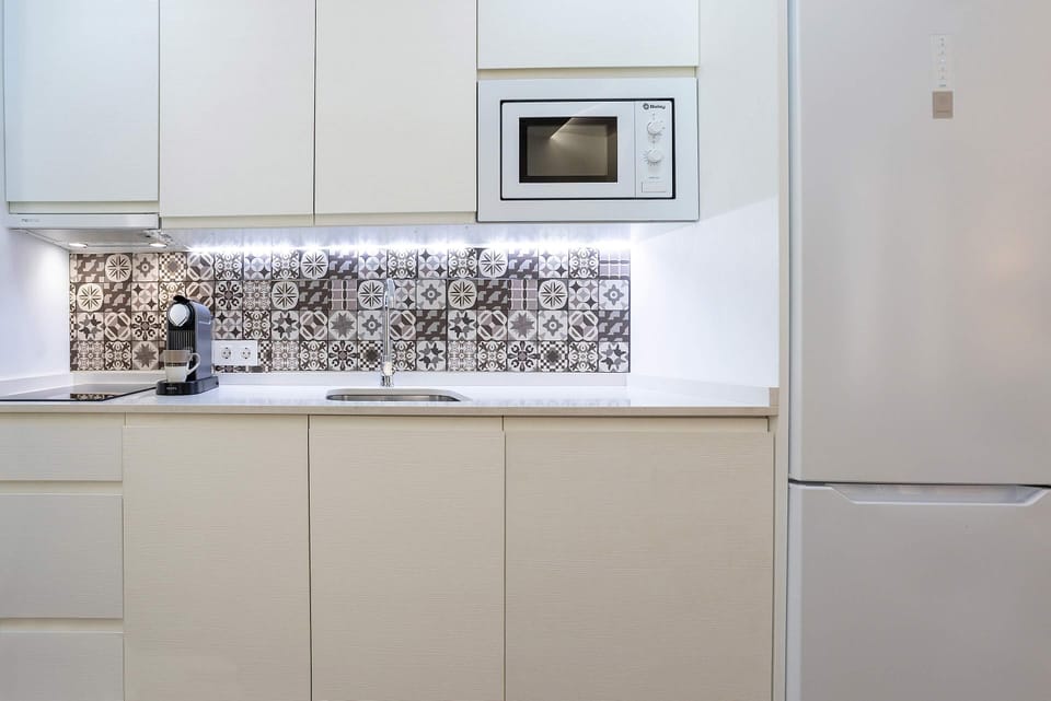 Apartment (1 Bedroom) | Private kitchen | Full-size fridge, microwave, stovetop, dishwasher