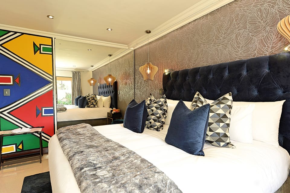 Superior Suite, 1 King Bed, Patio, Garden View | In-room safe, blackout drapes, iron/ironing board (on request)