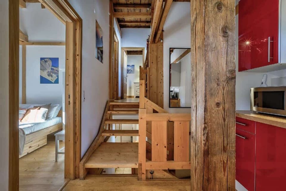 Staircase leading to the master bedroom & bedrooms in the basement.