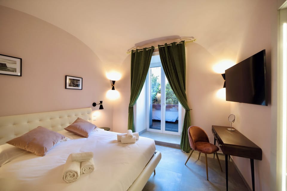 Deluxe Double Room, Balcony, City View | Free minibar, blackout drapes, soundproofing, iron/ironing board