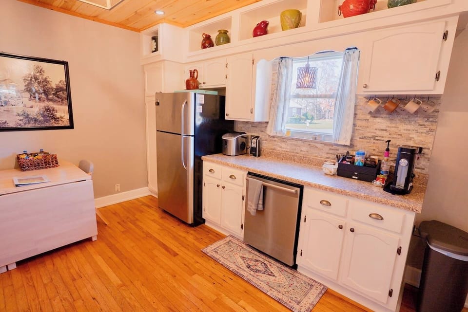 Fully stocked, family-friendly kitchen with modern appliances, plenty of counter space, and everything you need to cook meals or snacks together after a day of exploring Pigeon Forge.
