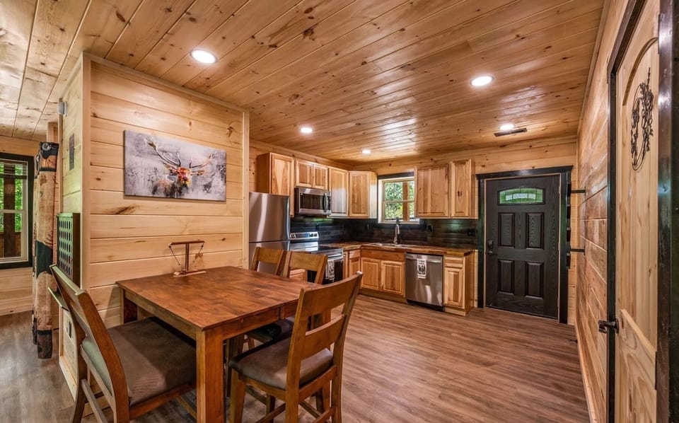 1st floor kitchen with dining table, off the living room.