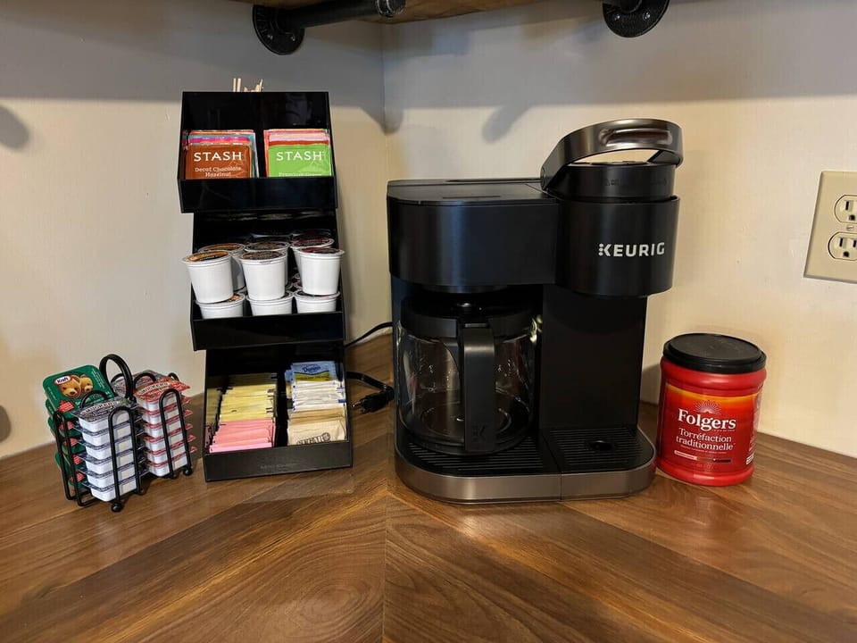 Start your mornings right with our fully stocked coffee station, featuring a Keurig machine and a variety of coffee and tea options!