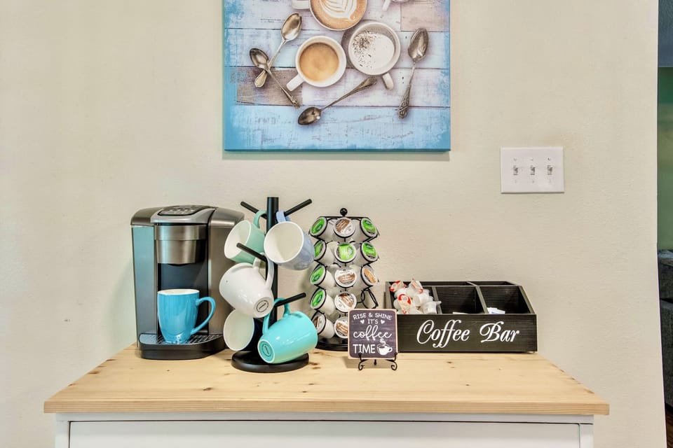 Enjoy mornings with a well stockedCoffee bar with K cup machine!!!! Take your coffee and step out into the sunroom for morning relaxation. 