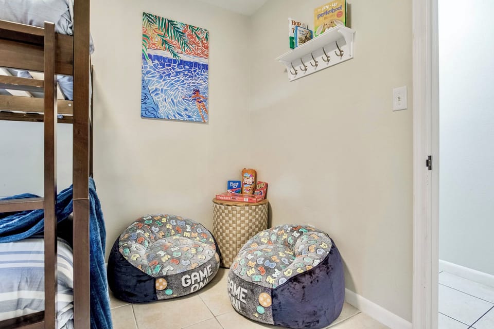 Two full over full bunk beds with a game room corner for kids or grown ups! Kids love having their own space !