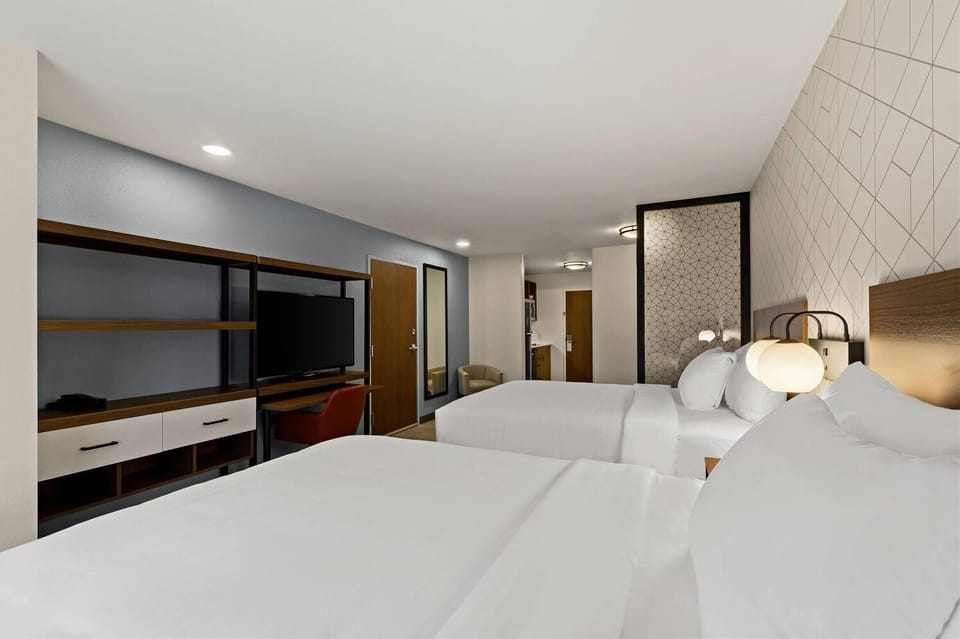 Drift off easily with soft lighting and plush bedding.