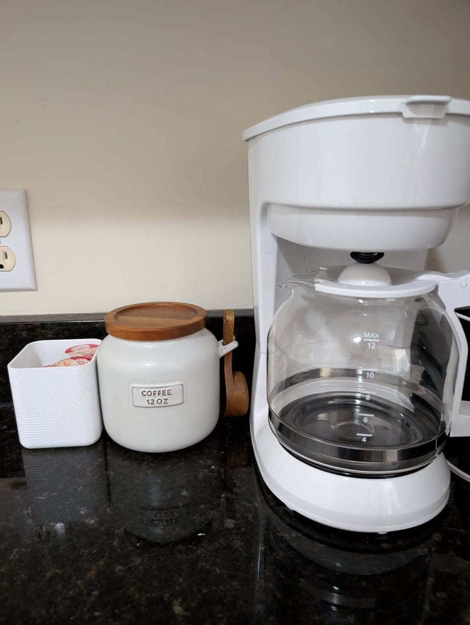 Coffee pot, coffee, sugar and creamer to start your stay