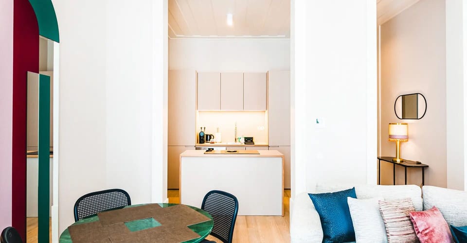 Gather for easy meals in a sleek, open-plan kitchen.