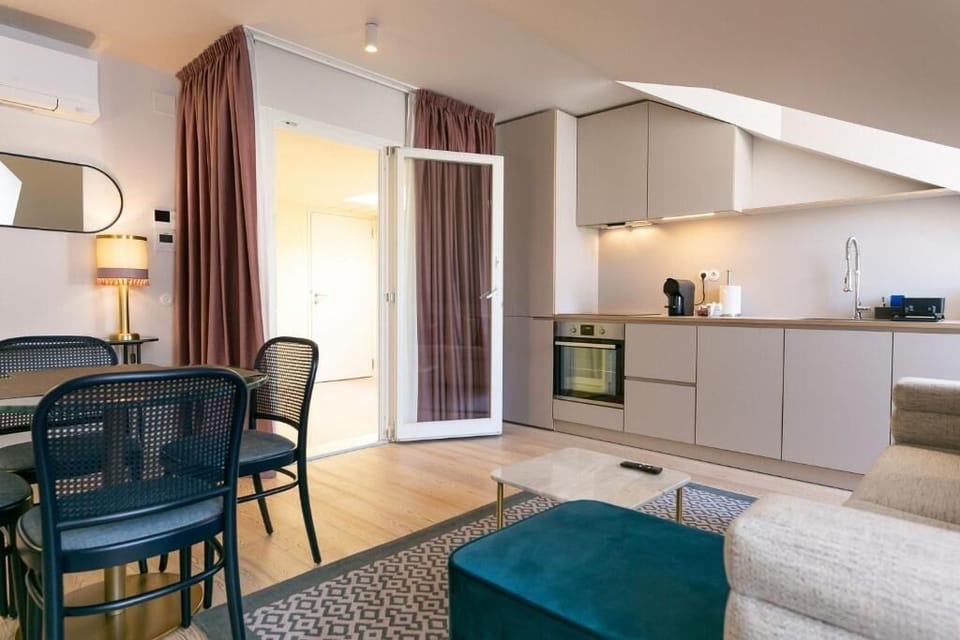Gather for cocktails in a bright open-plan living space.